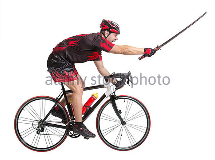Cyclist rides with samurai sword