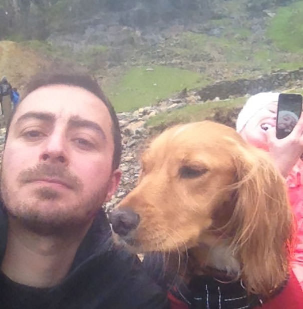 My friend climbed a mountain and took a selfie, was photo bombed by girlfriend taking selfie