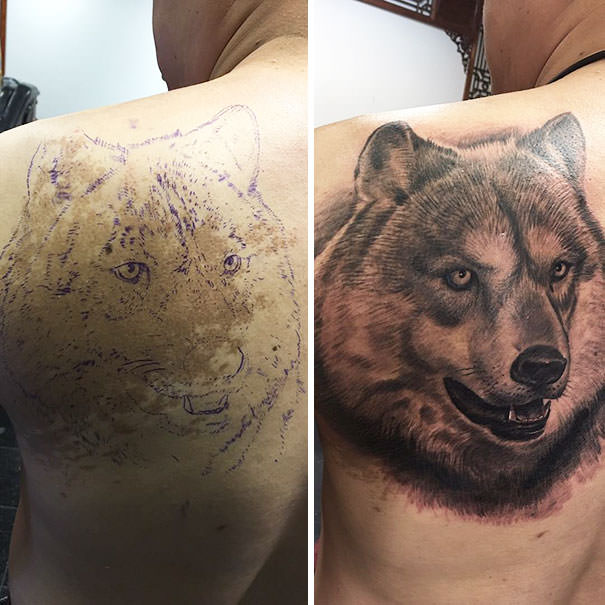 Wolf tattoo covering birthmark