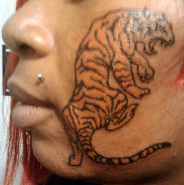 This dope tiger face tatt
