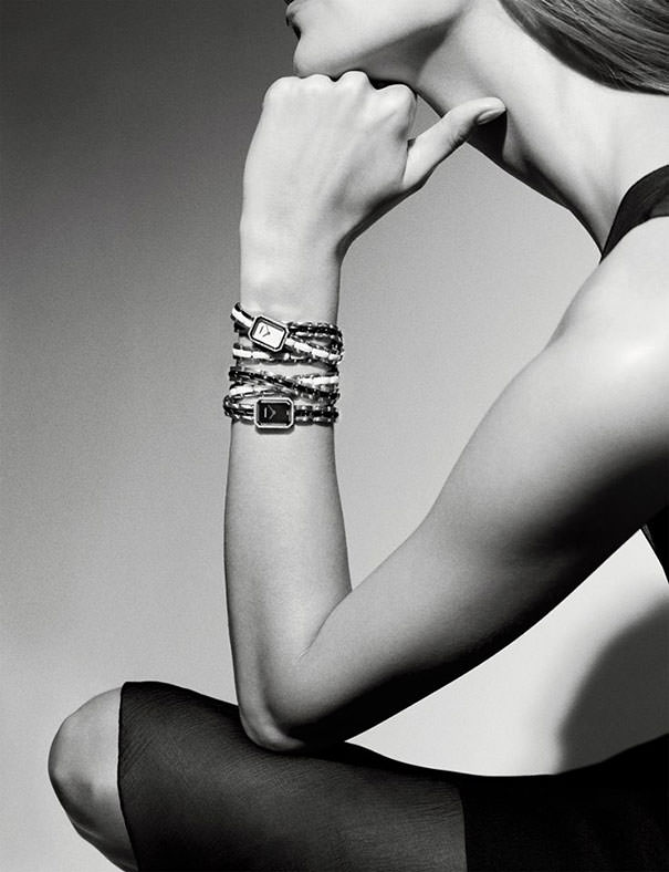 Chanel has turned their jewelry model into a giraffe in this photo.