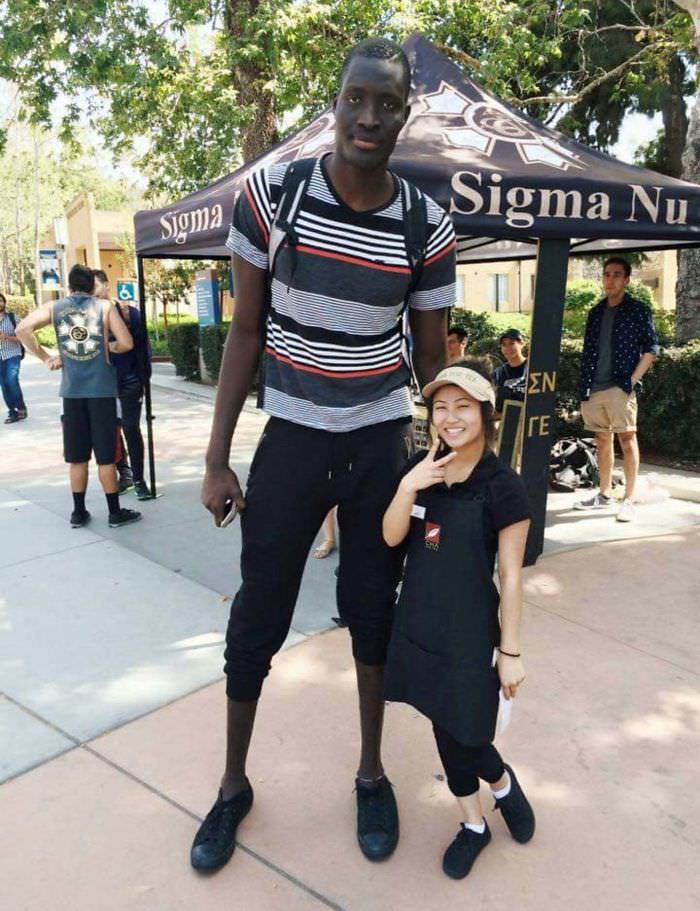That tall man and short woman.