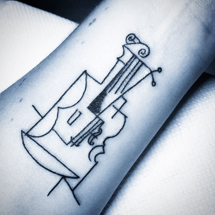 A tattoo of Picasso's "Guitar"