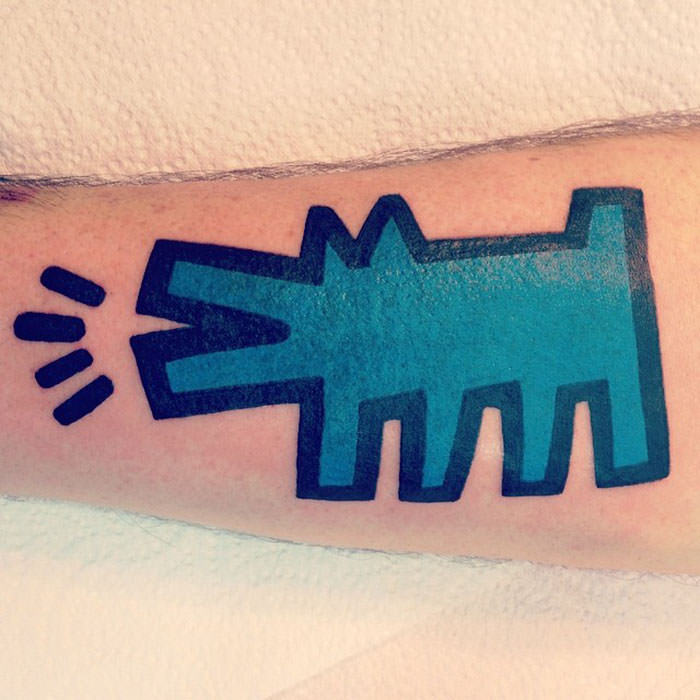 A tattoo inspired by Keith Haring's art