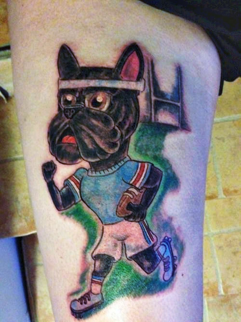 This Airbud spin-off tattoo looks strange and unappealing.