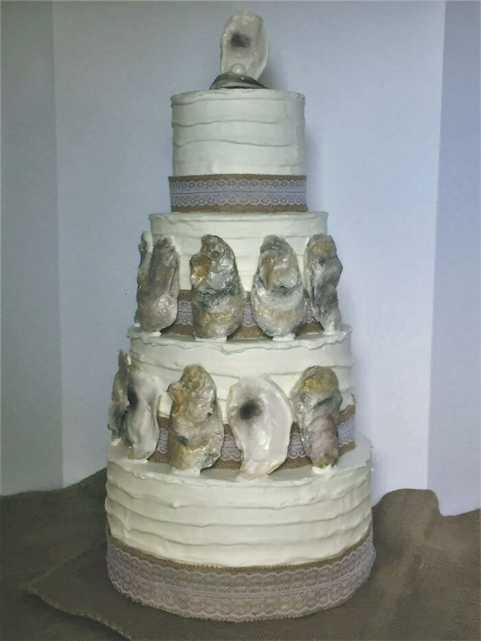 The sugar oysters on this wedding cake were edible and unique.