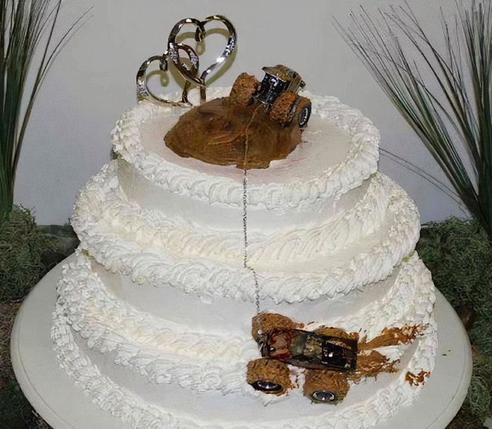 Mud toy trucks were used to decorate this wedding cake.