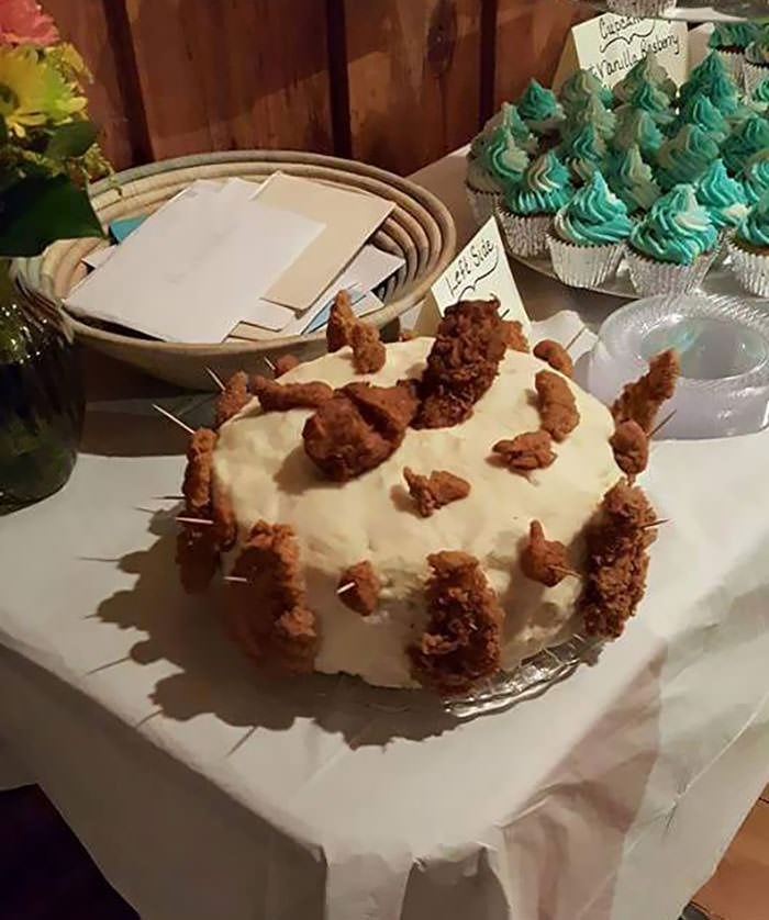 A wedding cake fail that was seen on a Facebook feed.