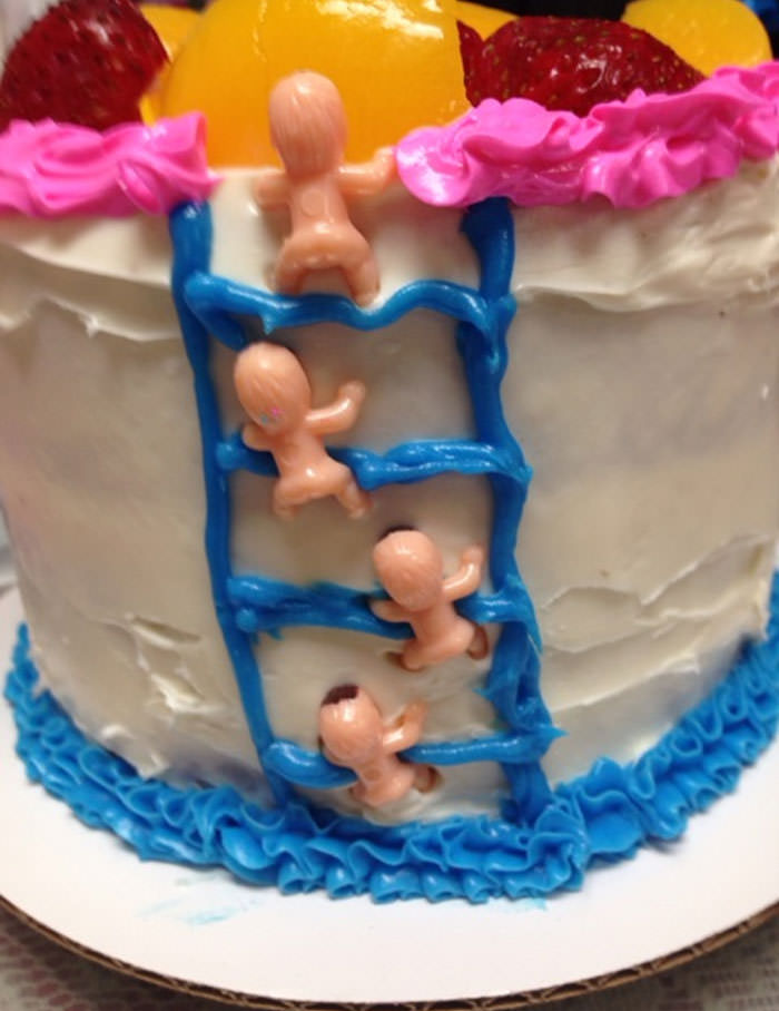 We aimed to create a beautiful wedding cake, but it ended up resembling a pregnant sumo wrestler.