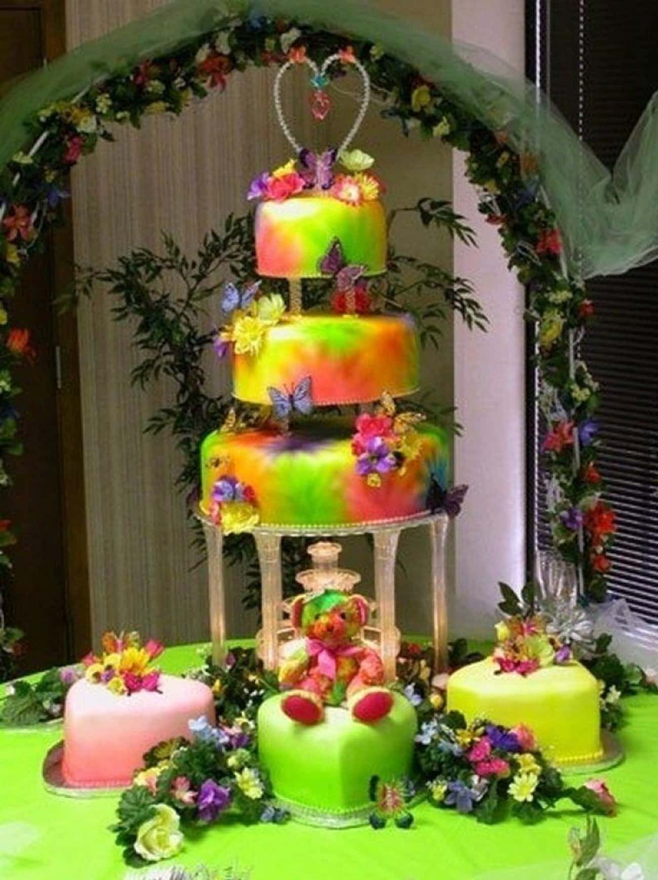 If Lisa Frank got married, this would probably be her wedding cake - colorful and whimsical.