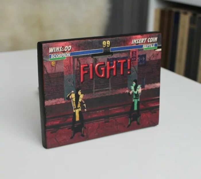 Transferring images onto any surface through acrylic decoupage with a passion for retro games