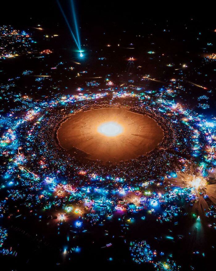 A shot of Burning Man that looks like a solar system.