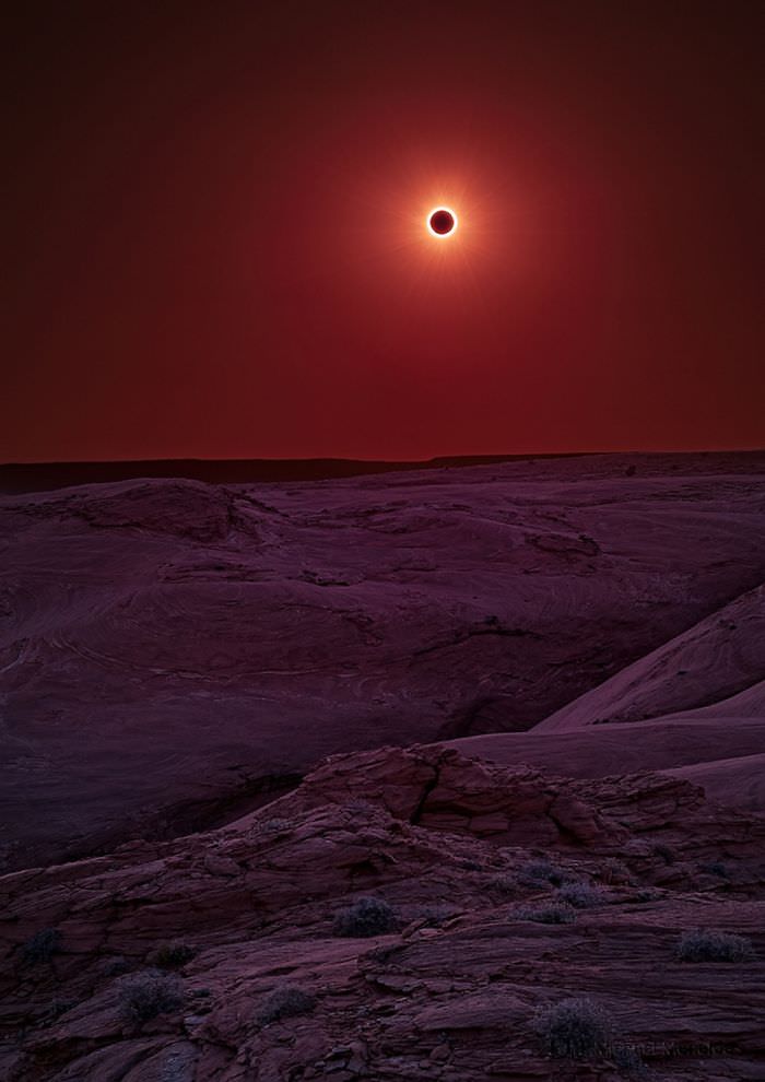 A solar eclipse in a canyon.