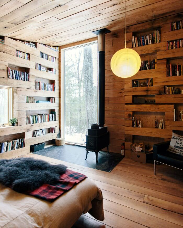 A secluded library in a tiny cabin in the forest in upstate New York