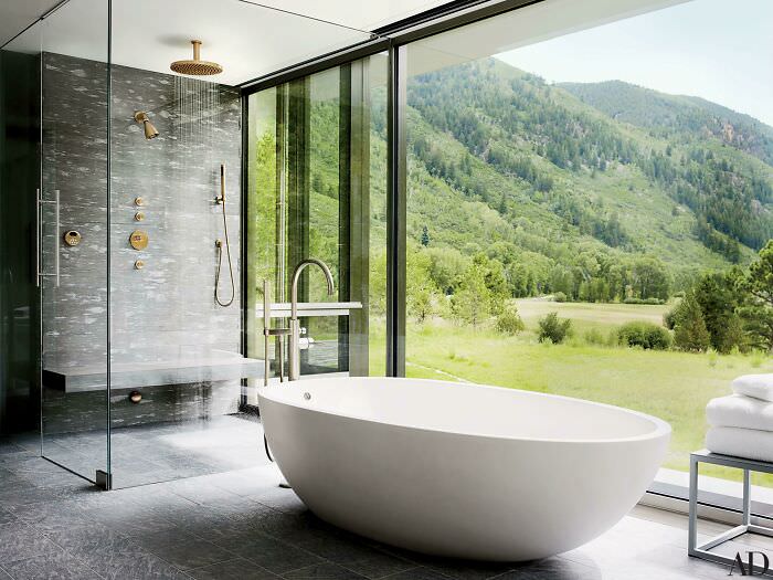 A large shower and bathtub with mountain views in Aspen, Colorado