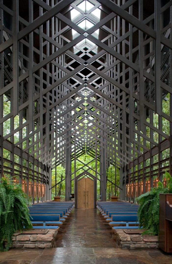 The sanctuary of Thorncrown Chapel in the Ozark Mountains features a central skylight and measures 48 feet high, 60 feet long, and 24 feet wide.