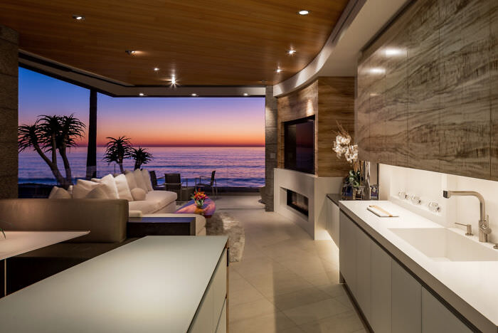 A kitchen and living room with a view of Windansea Beach in La Jolla, CA.