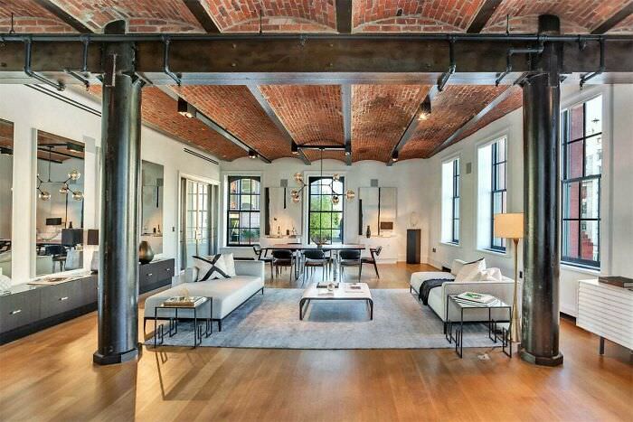 A loft in SoHo, NY with cast iron columns and brick barrel vaulted ceilings.