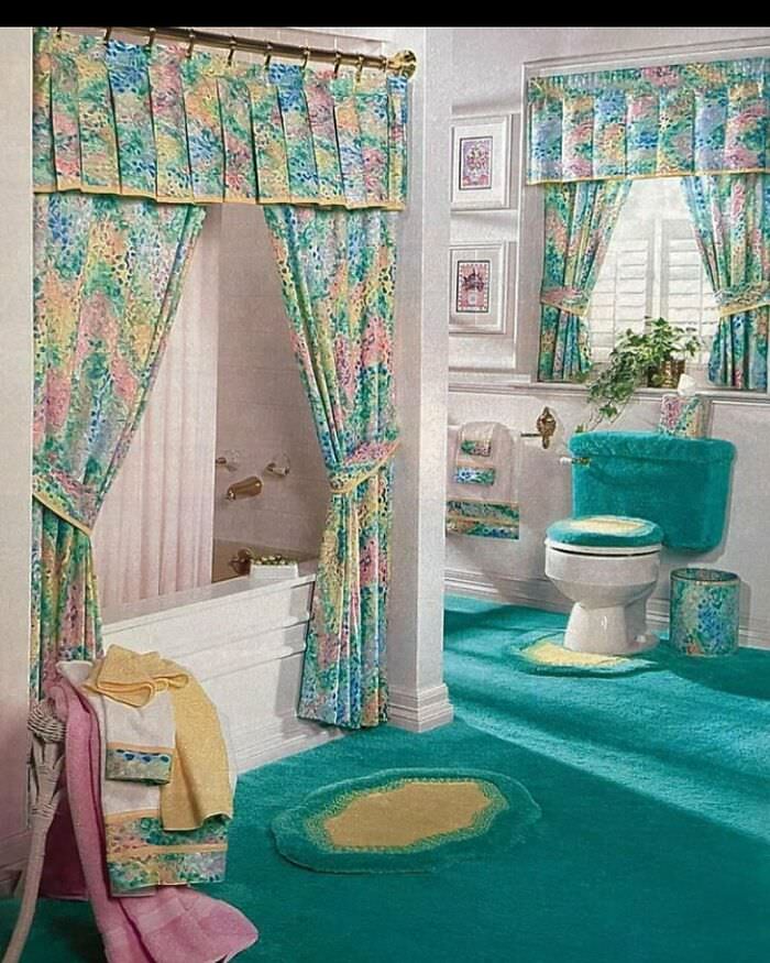 This house is a throwback to a simpler time when everything matched, including the trash can, curtains, towels, and carpet.