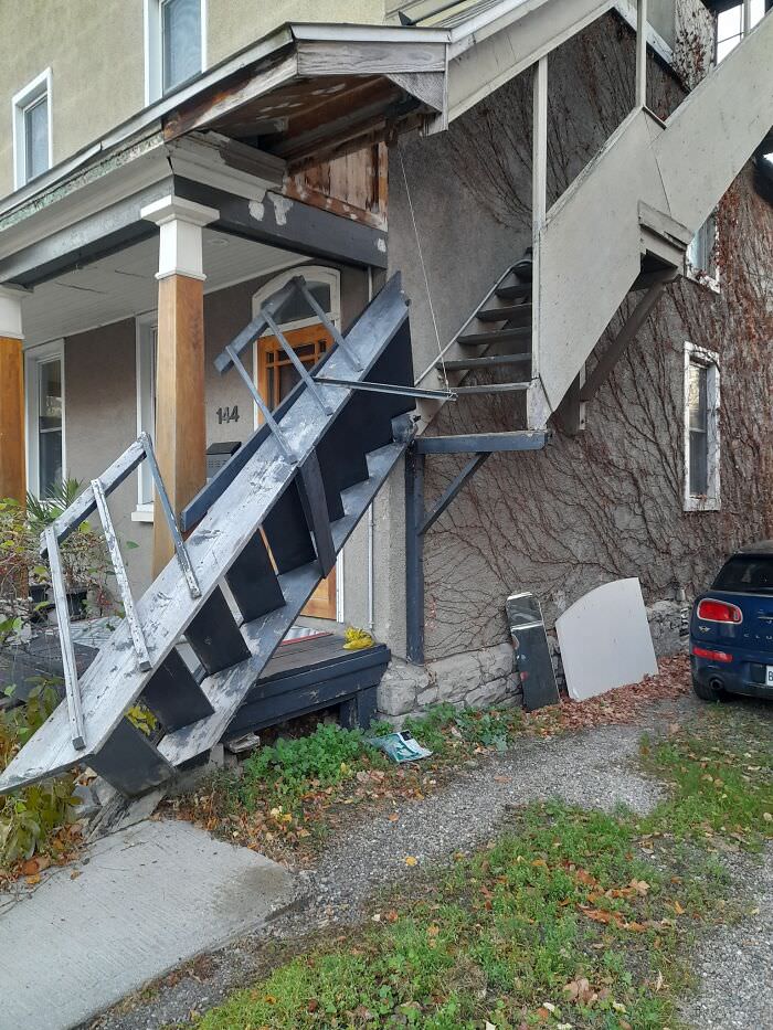 Moveable stairs to make room for the car.