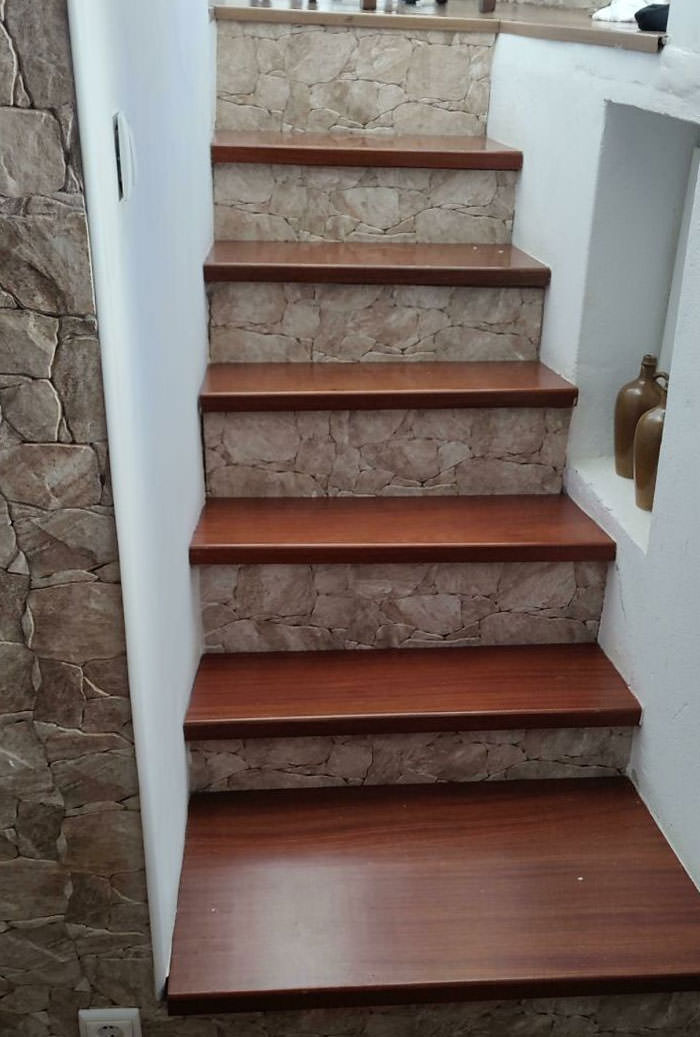These stairs in an Airbnb have every step at a different height, width, and depth.