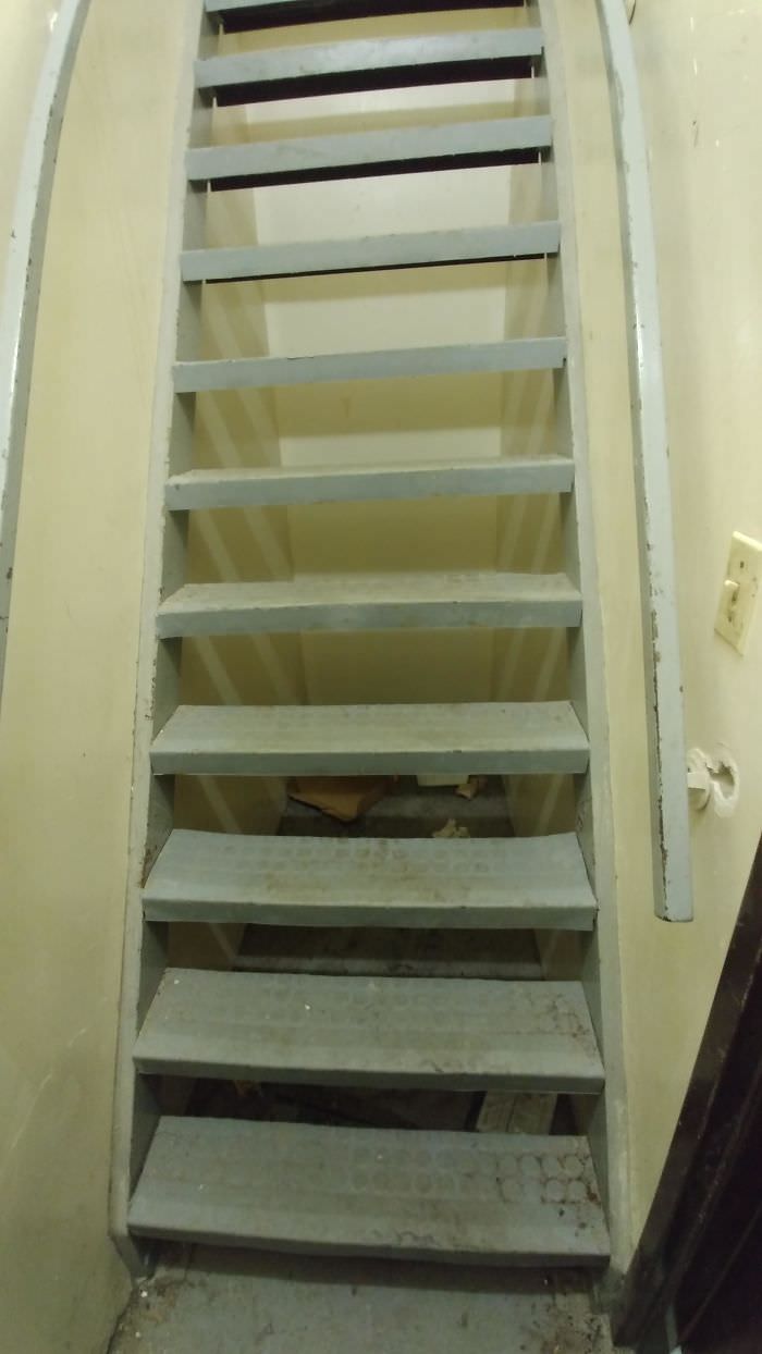 These stairs have no access to retrieve items that fall through.