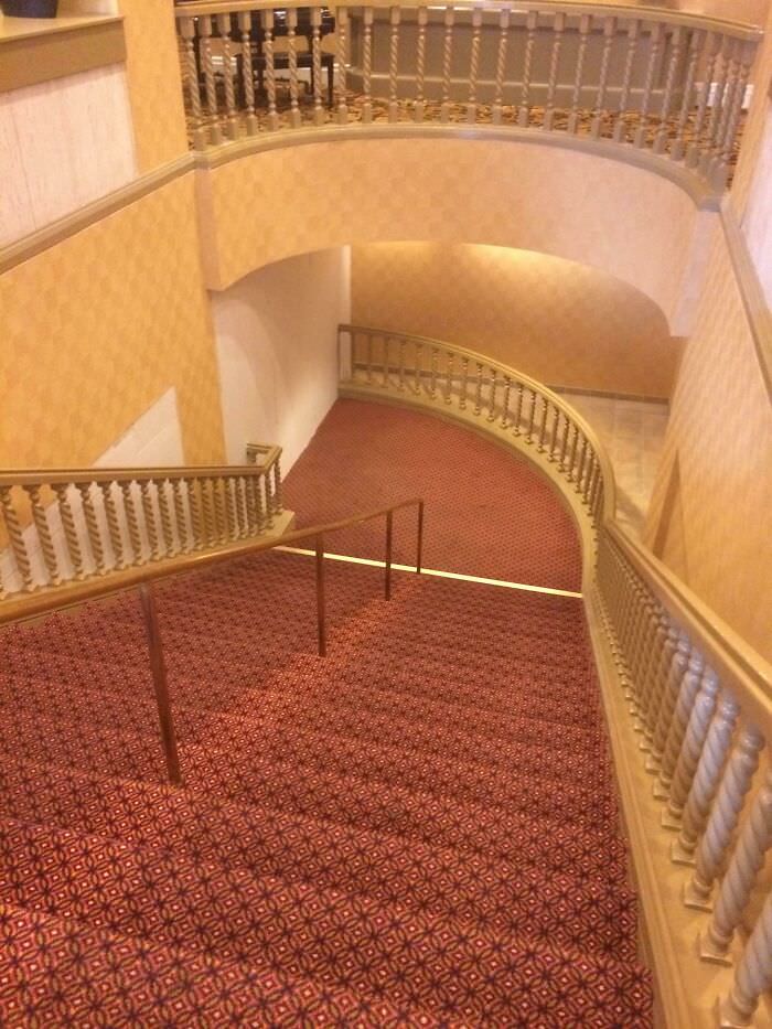This fancy staircase leads directly into a wall.