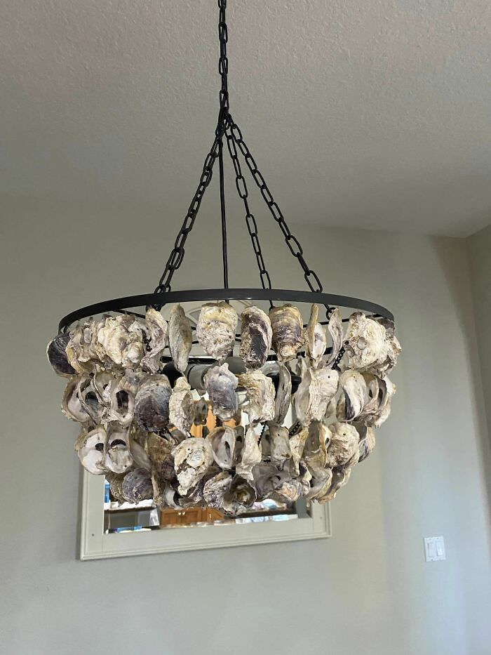 This chandelier, made of sea shells, is frustrating to clean.