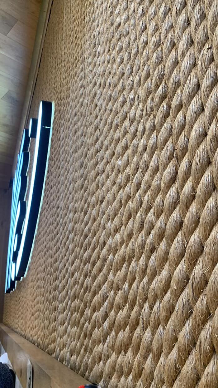The rope wall at this sushi place is not designed for easy cleaning.