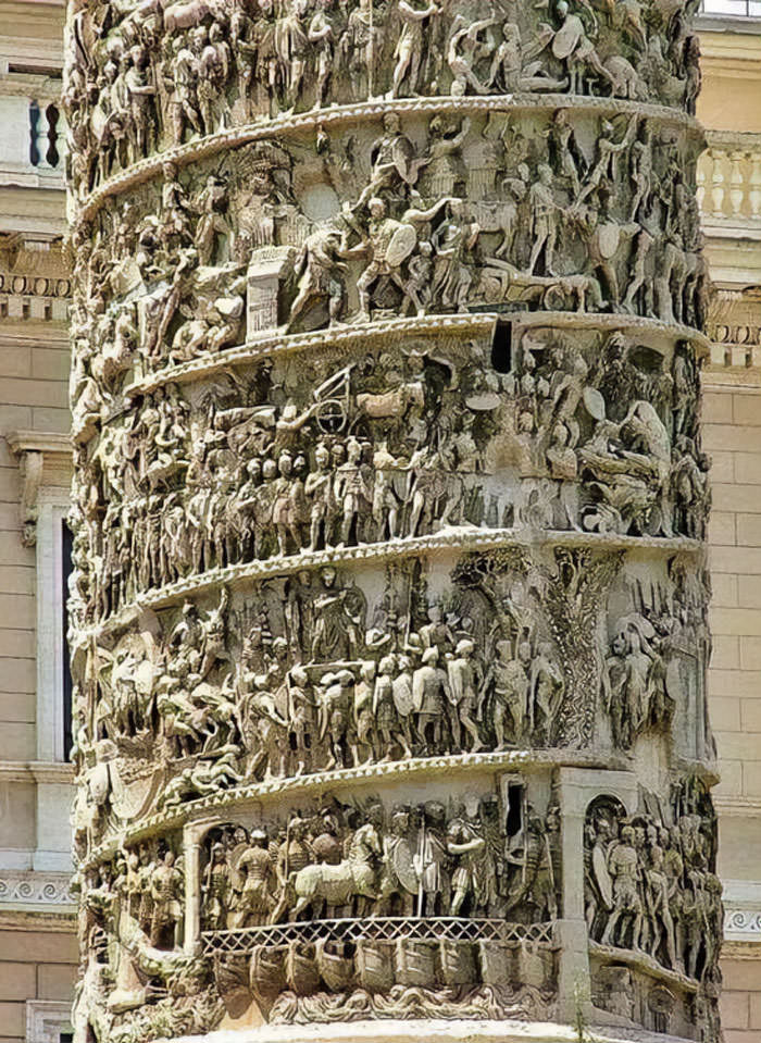 Architectural details of the Column of Marcus Aurelius. Carved military scenes line this 2nd -century column in Rome, Italy.