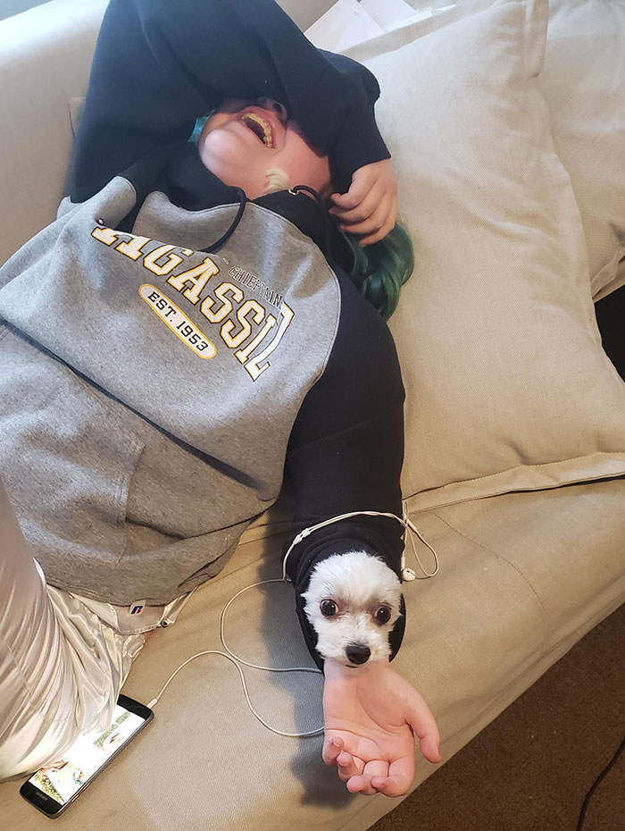 So, Cassidy, my daughter, was snuggling Elsa, our rescue pup, under her hoodie. I walked into the room and asked 'Where's Elsa?' Well, Elsa tried to get to me