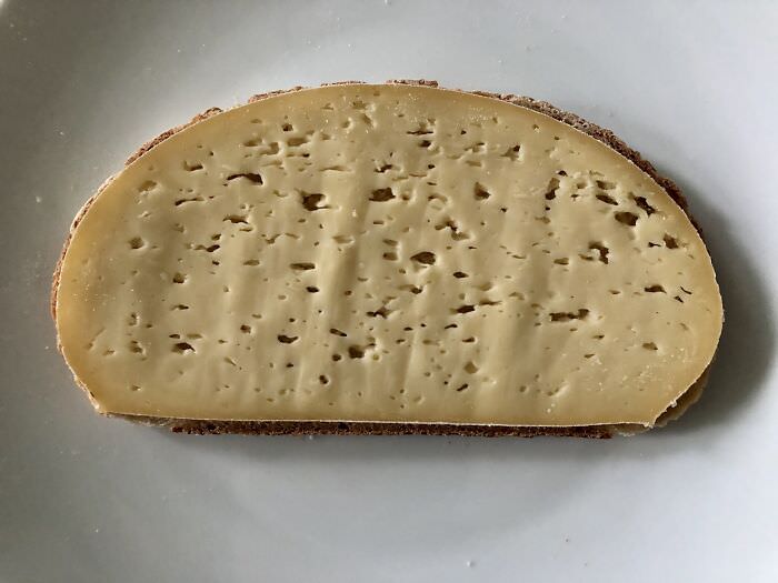 This slice of bread was made for this cheese