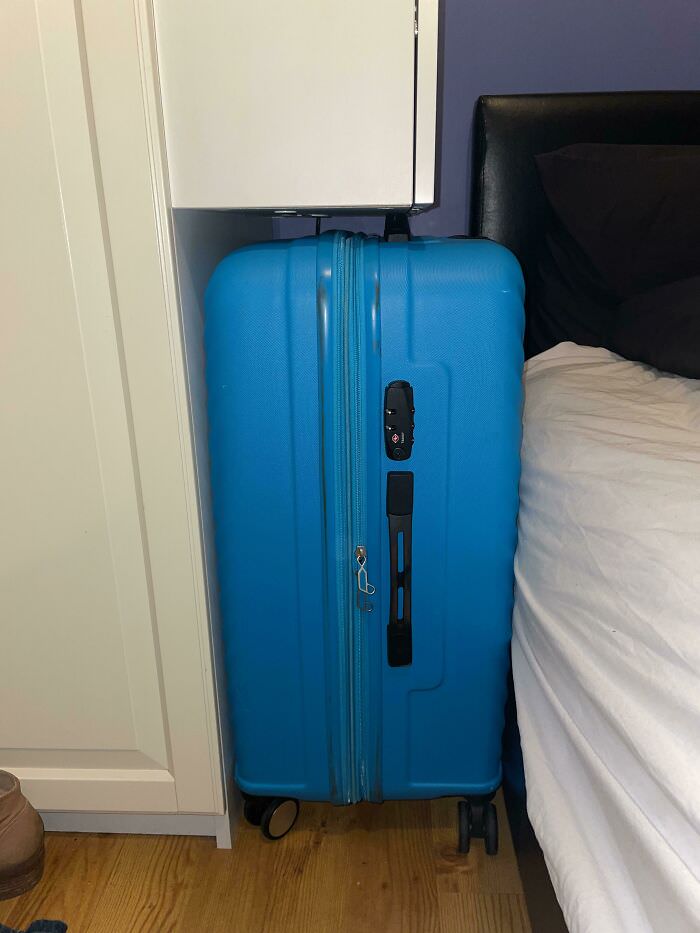 My suitcase fitting perfectly in my Airbnb