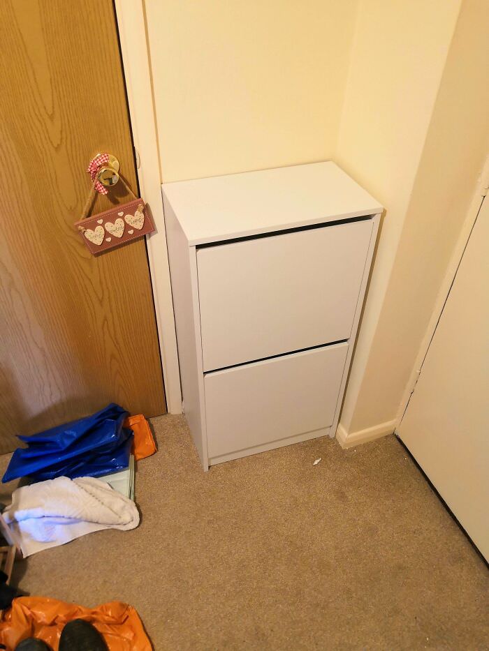 The cupboard fits perfectly into the space, a huge relief