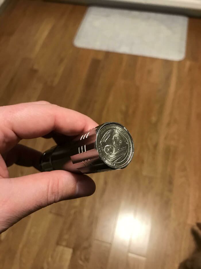Flashlight blocked by a quarter, inconveniently placed