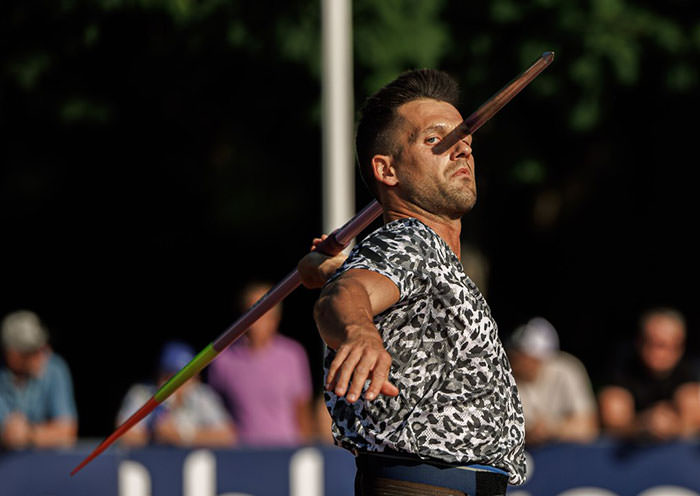 Estonian javelin thrower's shadow aligning with the camera angle
