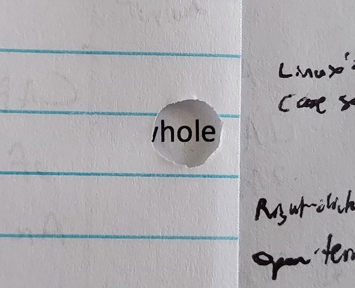 Unexpectedly aligned punch hole in notes
