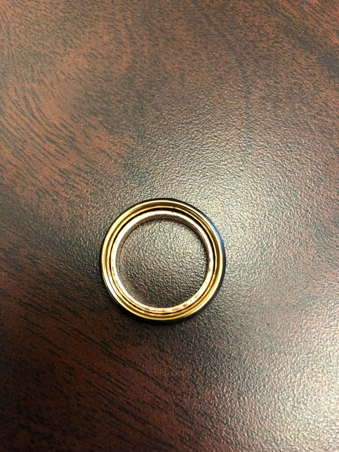 Wife's wedding ring inside husband's ring