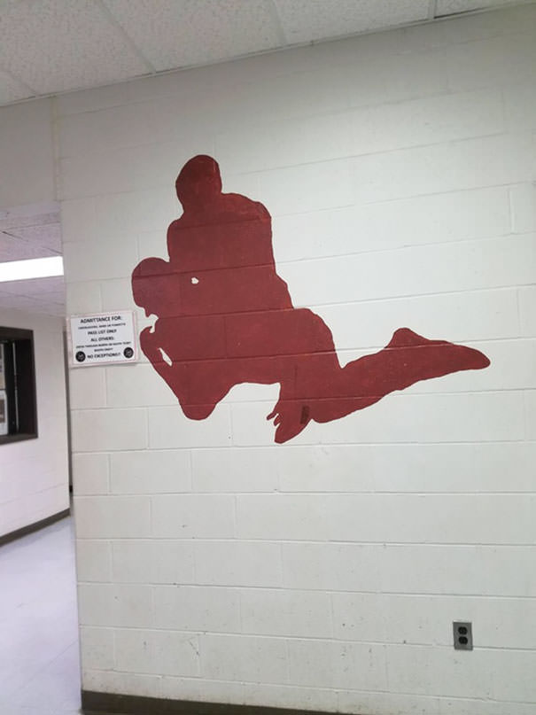 This wrestling painting at a high school.