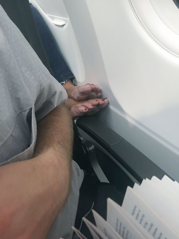 Entitled person on an airplane doesn't understand personal space.
