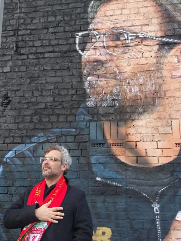 My friend found his lookalike on a wall in Liverpool.