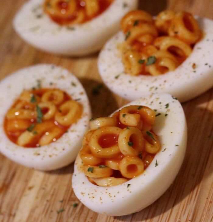 Deviled eggs with spaghettis.