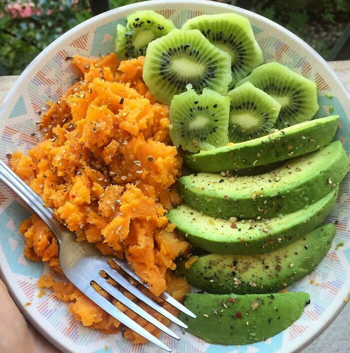 What to do with the leftover half of a cooked sweet potato from lunch - mashed it up, left it cold, and added avocado and kiwi. This combination was awesome.