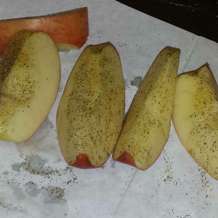 Apparently salt and pepper on apples is something people do. It's so delicious.