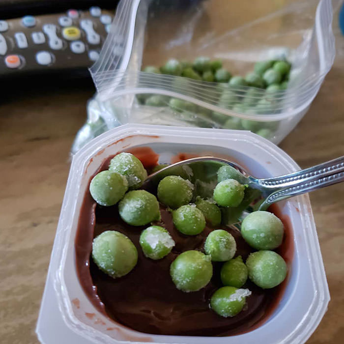 Frozen peas and chocolate pudding. The perfect lazy Sunday afternoon snack.