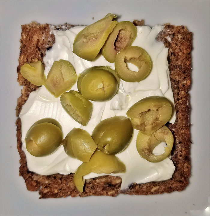 Cream cheese and olive sandwich