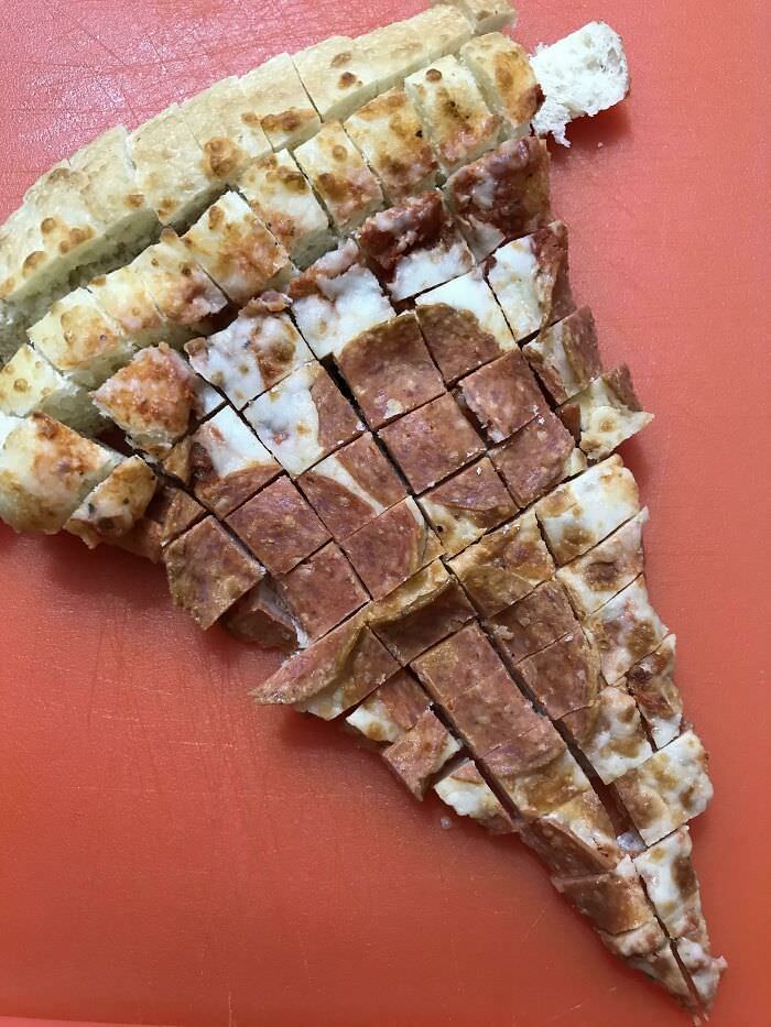 I like to cut my pizza into small cubes and eat it with a tiny fork. A friend said it belonged here