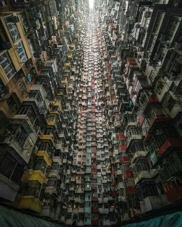 This is quarry bay, hong kong. But the image is edited. The real building is only about one 10th as tall as this.