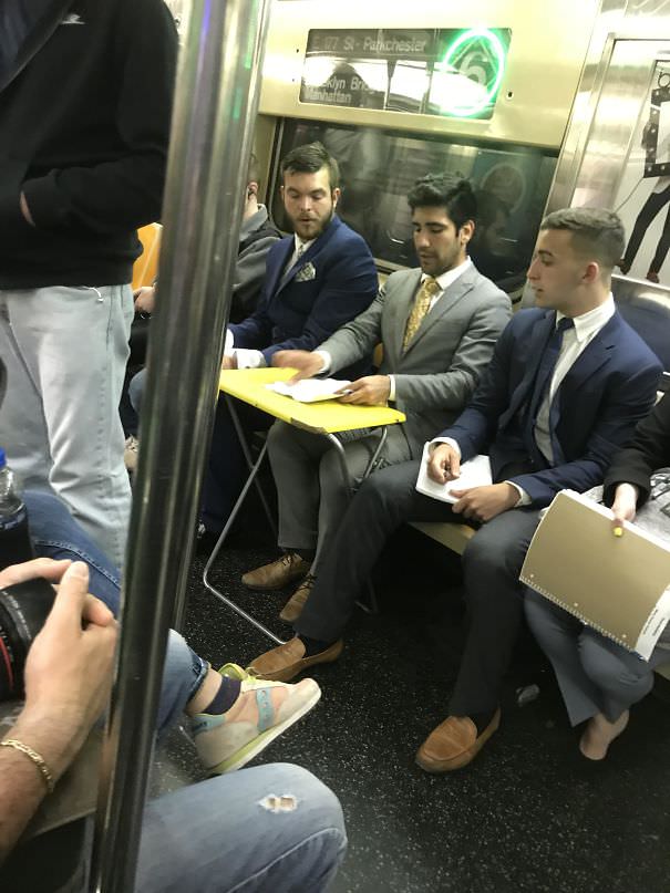 Dude Just Whipped Out This Desk On The Subway And Started His Meeting