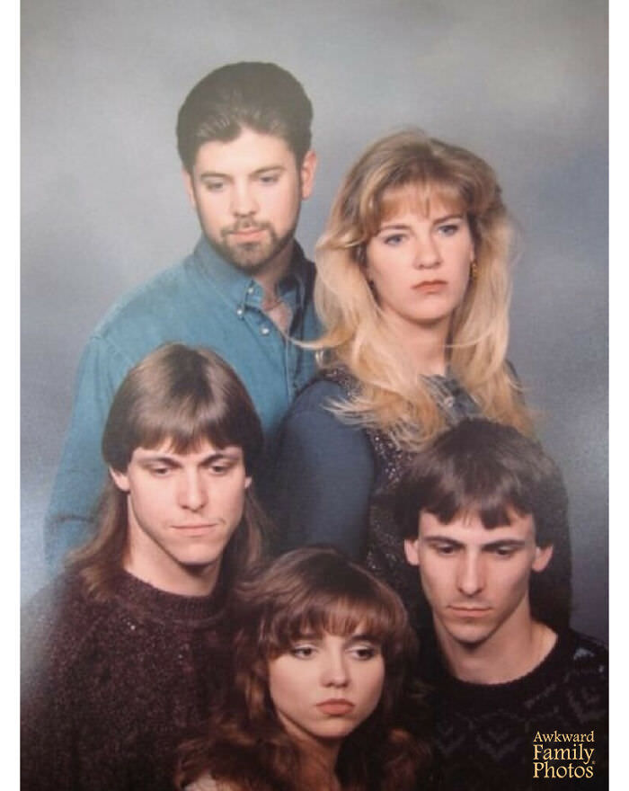 1993. My siblings and me (the blonde) got the great idea to take a portrait of ourselves for a surprise christmas present for our mom. However, none of us were in the mood for photos on that particular day